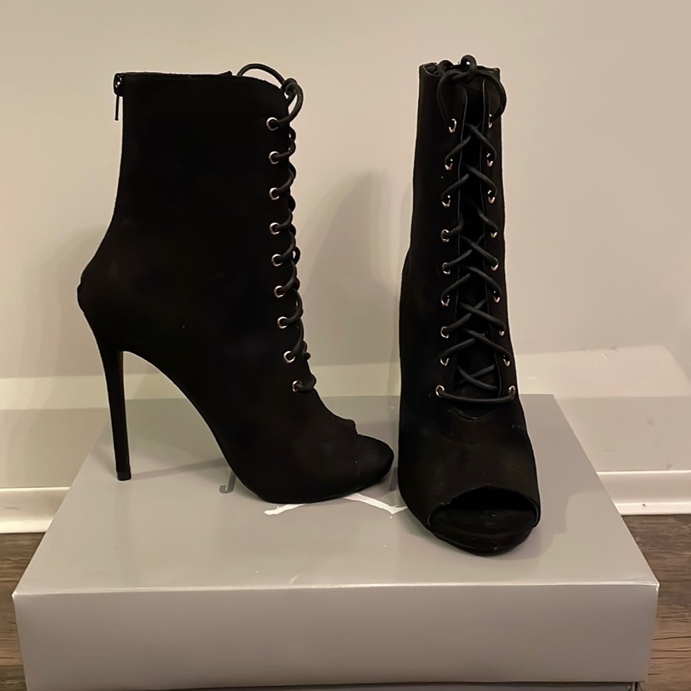 Black, laced up, zip up in the back, boots